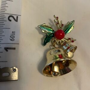 Vintage pin with gold bells that jingle and Holly